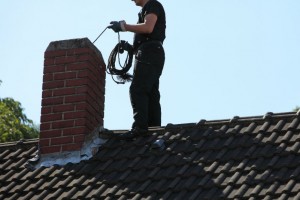Chimney Technician on Roof - Memphis TN - Coopertown Services